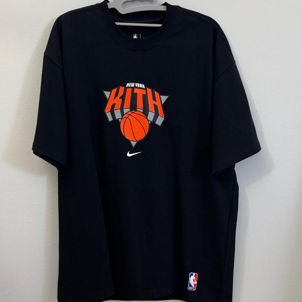 Kith NYK Black Tee with Orange Basketball Graphic